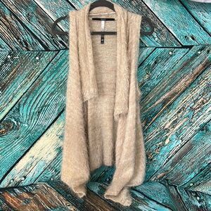 * Kenzie brand cream, fuzzy long sweater vest